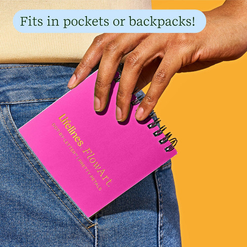 small notebook with pink cover