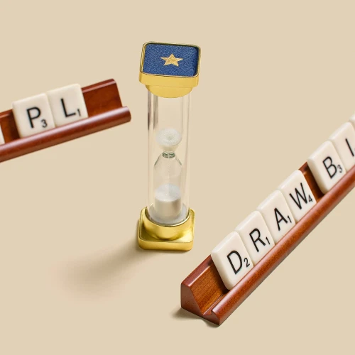 Closeup on sand timer and letter trays