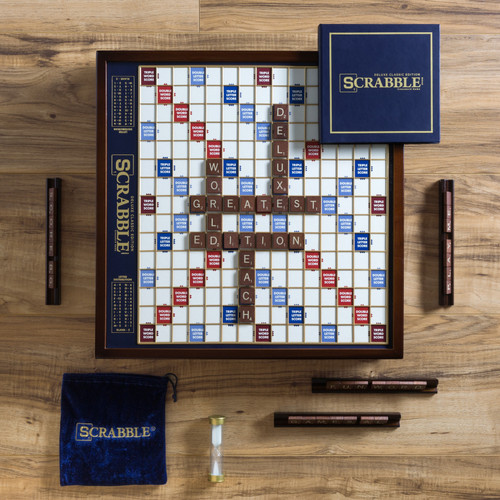 View from above of Deluxe Classic Scrabble board and components on a table