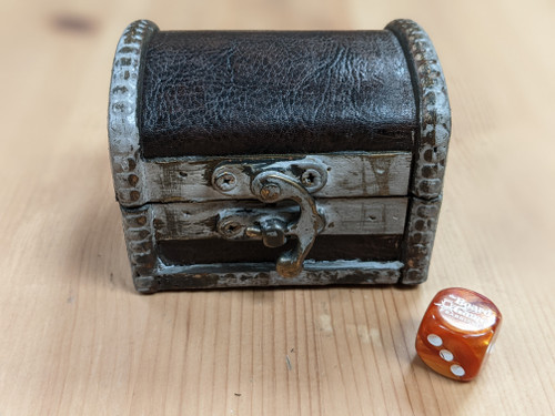 Black leather with silver-ish boarders 