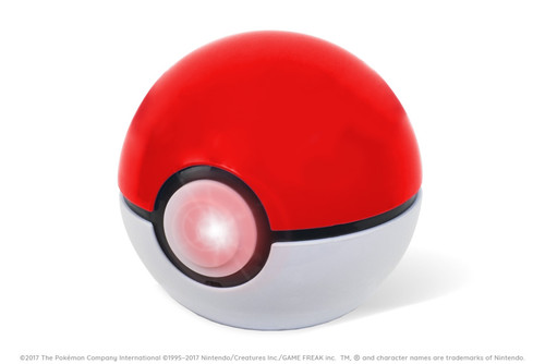 a Pokémon ball  with a red/pink glowing button 