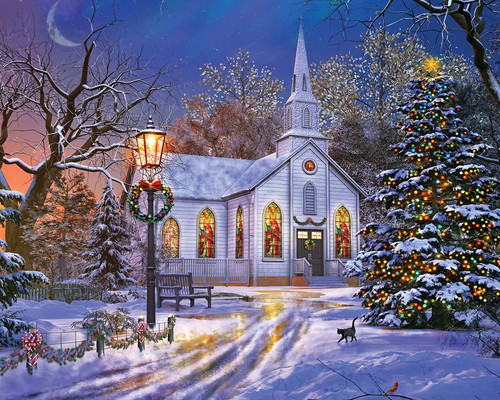 A Chapel in the snow with a street lamp light