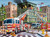 Fire Truck Rescue close up depicting  3 firetrucks fighting a 4th story fire