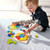 Child playing with Magical Pyramids Arranging Game