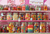Candy Store puzzle image, featuring jars on colorful candies on pink shelves