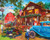 completed puzzle with a barn in the background and a general store with fruits and veggies out front. 