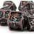 Metal black and silver dice with blood-like spattering of red