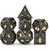 Black metal dice with gold numerals