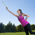 A person catches an Aerobie Pro Ring from the air