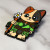 Enamel pin depicting a cute cat in adventuring gear