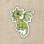 Sticker art depicting a baby green dragon