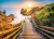 Puzzle image, depicting wooden stairs down to a rocky beach