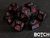 black dice with red numbers