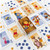 front and back of cards featuring characters from Winnie the pooh and blue and yellow suit colors