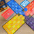 Genius Trivia Game game lay out, different colored panels, cards, and a timer