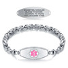 Image of a silver medical alert bracelet and an engraved tag displayed on a white background. The bracelet features a Byzantine chain design and a central ID plate with a pink Star of Life symbol. Above the bracelet, a separate silver tag is shown, engraved with 'DIABETES/INSULIN,' 'BLOOD THINNER,' 'ALLERGIC TO NUTS,' and 'ICE: (619) 866-4768.' Both items have a polished, brushed metal finish, emphasizing durability and clarity.