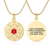 A gold medical alert necklace with a circular pendant displayed against a white background. The front of the pendant features an intricate, textured mandala design with a prominent red medical alert symbol at the center. The reverse side shows engraved medical information in black text: "SAM JOHNSON, TYPE II DIABETES, ICE CONTACT, 619-866-4768." The necklace includes a polished gold snake chain, and the pendant is attached via a smooth gold bail. A subtle reflection of the necklace is visible below, enhancing its elegant presentation.
 A gold medical alert necklace with a circular pendant displayed against a white background. The front of the pendant features an intricate, textured mandala design with a prominent red medical alert symbol at the center. The reverse side shows engraved medical information in black text: "SAM JOHNSON, TYPE II DIABETES, ICE CONTACT, 619-866-4768." The necklace includes a polished gold snake chain, and the pendant is attached via a smooth gold bail. A subtle reflection of the necklace is visible below, enhancing its elegant presentation.