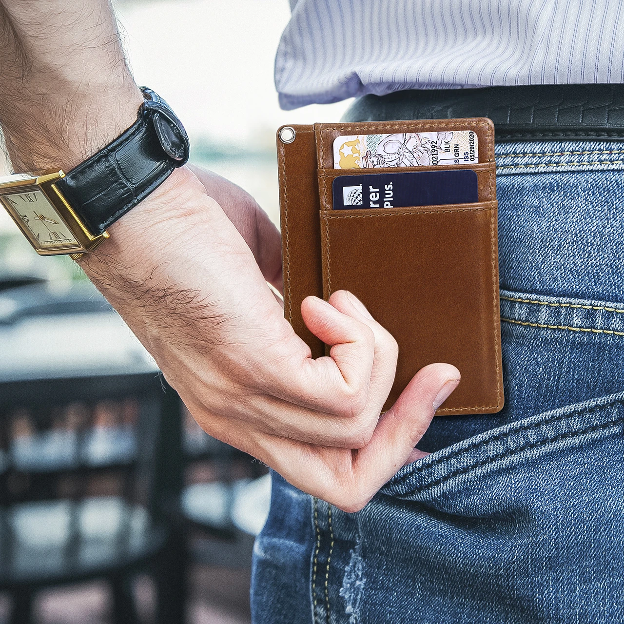 BISONDALE minimalist wallet slipping into a jeans front pocket
