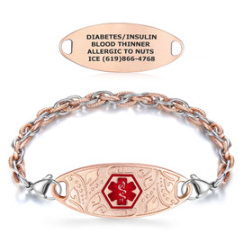Image of a rose-gold medical alert bracelet and a separate engraved tag on a white background. The bracelet features a central oval ID plate with an intricate floral pattern and a red hexagonal Star of Life symbol. Its chain is a two-tone braided design of rose-gold and silver, secured with lobster clasps. Above the bracelet, a matching rose-gold tag is engraved with 'DIABETES/INSULIN,' 'BLOOD THINNER,' 'ALLERGIC TO NUTS,' and 'ICE: (619) 866-4768.' Both items combine functionality with elegant design. Image of a rose-gold medical alert bracelet and a separate engraved tag on a white background. The bracelet features a central oval ID plate with an intricate floral pattern and a red hexagonal Star of Life symbol. Its chain is a two-tone braided design of rose-gold and silver, secured with lobster clasps. Above the bracelet, a matching rose-gold tag is engraved with 'DIABETES/INSULIN,' 'BLOOD THINNER,' 'ALLERGIC TO NUTS,' and 'ICE: (619) 866-4768.' Both items combine functionality with elegant design.