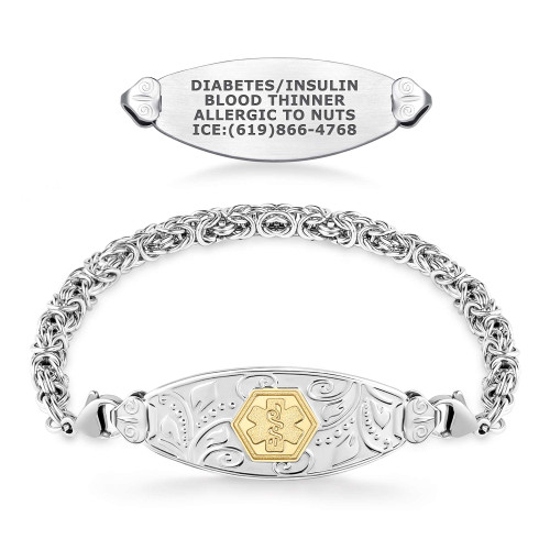 A silver medical alert bracelet with a decorative Byzantine chain and a central ID plate featuring an engraved floral pattern and a gold-colored medical alert symbol. Above the bracelet, a separate engraved medical ID tag displays critical health information, including "DIABETES/INSULIN," "BLOOD THINNER," "ALLERGIC TO NUTS," and an emergency contact number. Both items are set against a plain white background. A silver medical alert bracelet with a decorative Byzantine chain and a central ID plate featuring an engraved floral pattern and a gold-colored medical alert symbol. Above the bracelet, a separate engraved medical ID tag displays critical health information, including "DIABETES/INSULIN," "BLOOD THINNER," "ALLERGIC TO NUTS," and an emergency contact number. Both items are set against a plain white background.