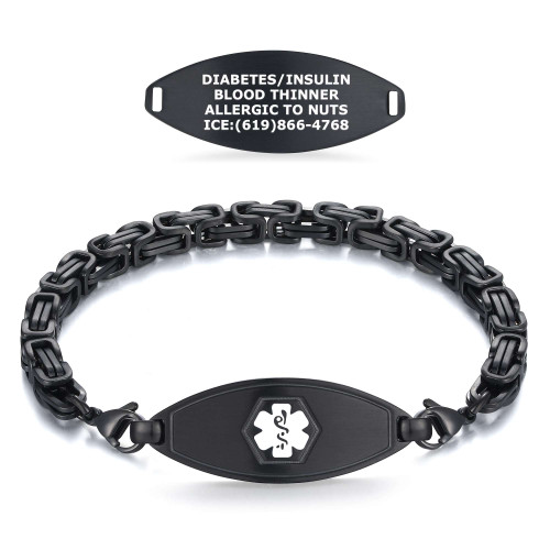 Image of a black medical alert bracelet displayed on a white background. The top section shows a standalone black medical alert tag engraved with 'DIABETES/INSULIN,' 'BLOOD THINNER,' 'ALLERGIC TO NUTS,' and 'ICE: (619) 866-4768.' Below, the full bracelet is laid out in a curved shape, featuring a robust black chain with a central tag displaying a white 'Star of Life' symbol. The bracelet’s chain has a textured, matte finish, and the design emphasizes durability and readability.