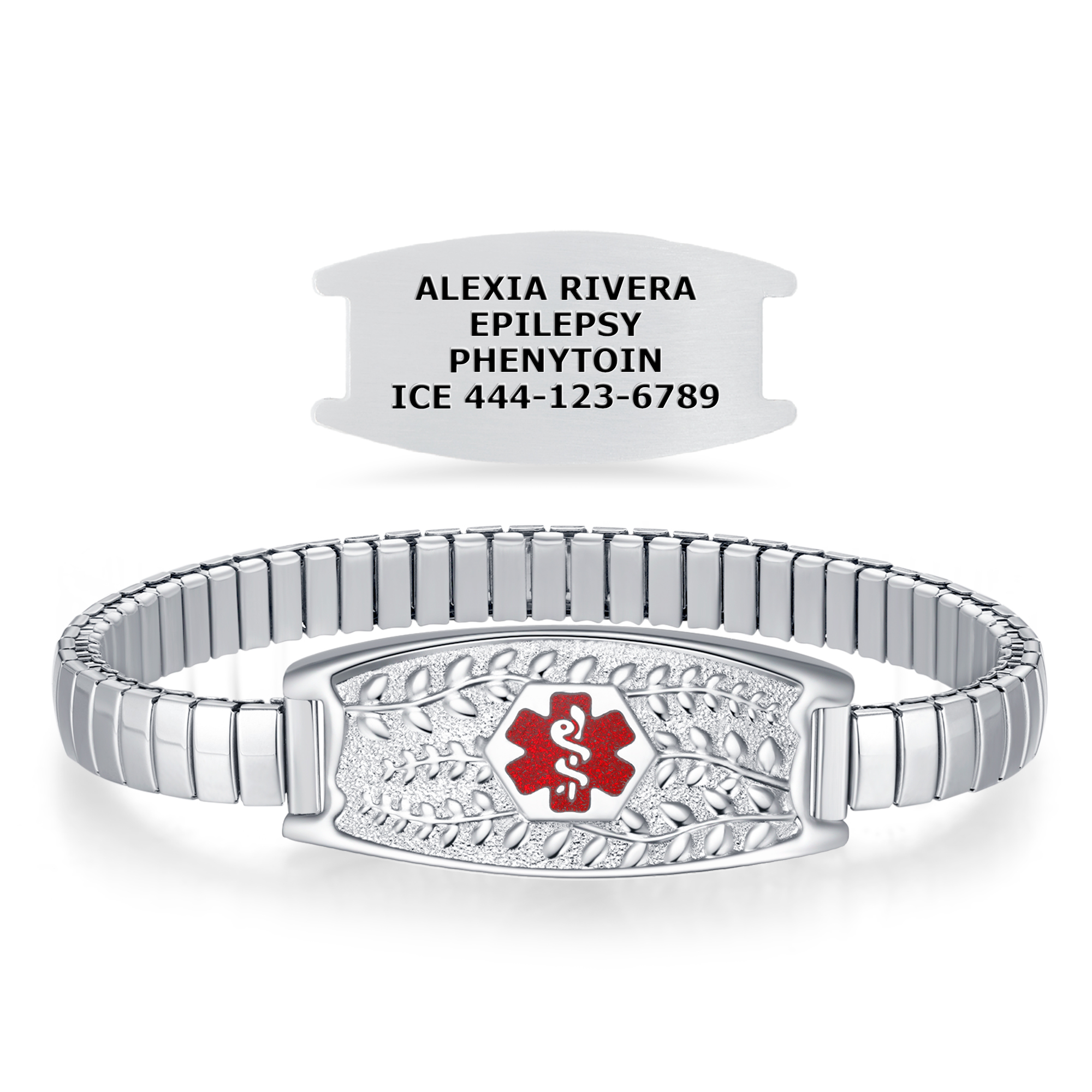 A silver medical alert bracelet with an expandable link design and a decorative central plate featuring a red hexagonal medical symbol with a white Rod of Asclepius. Above the bracelet, a separate brushed silver medical alert tag displays the text: "Alexia Rivera," "Epilepsy," "Phenytoin," and "ICE 444-123-6789." The bracelet combines functionality with an elegant design, set against a plain white background.