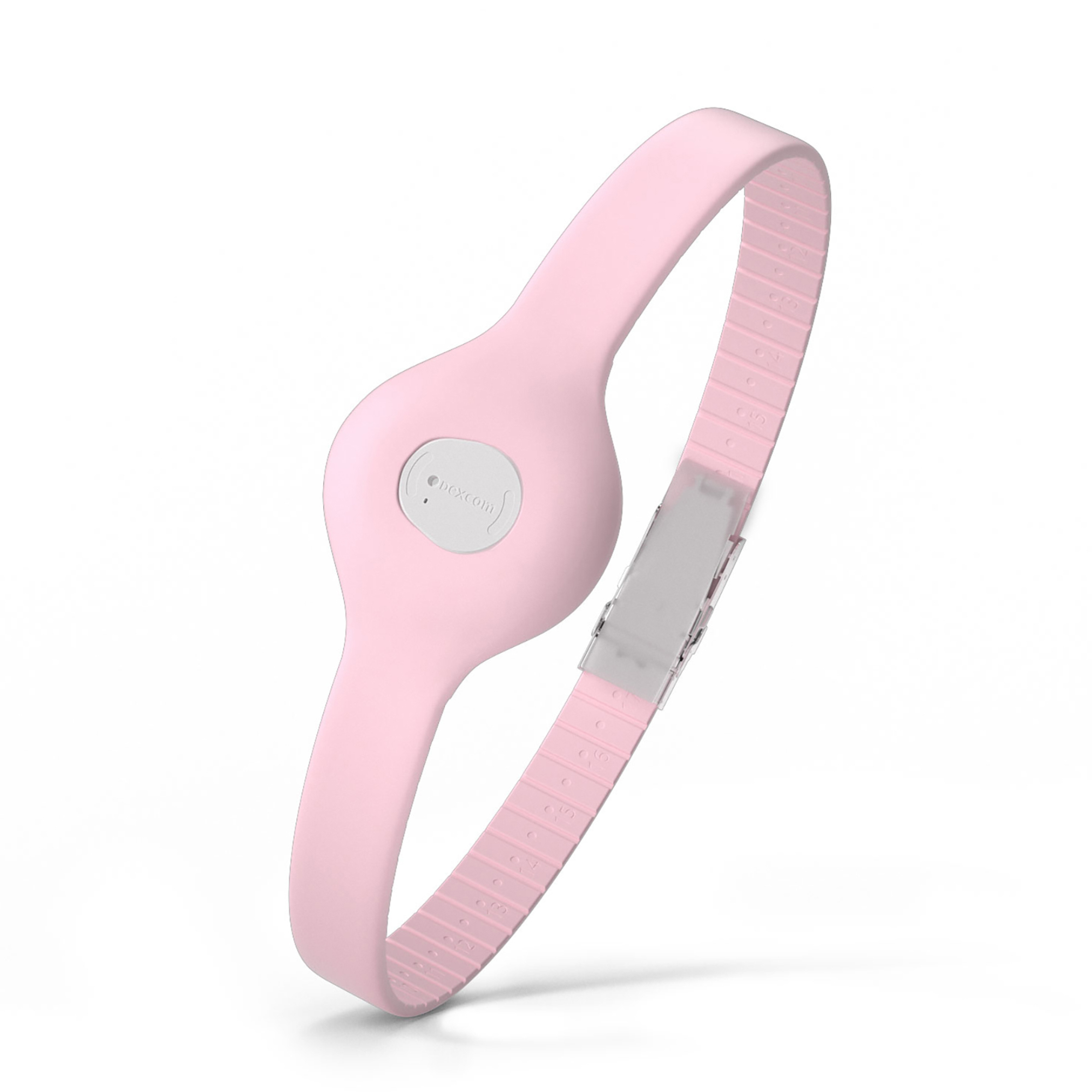 A pink wristband with an embedded light gray oval module featuring the "dexcom" logo and a small dark circle. The band has a ribbed inner surface with faint numerical markings for adjustability and connects via a translucent clasp. The design is sleek and modern, set against a plain white background.