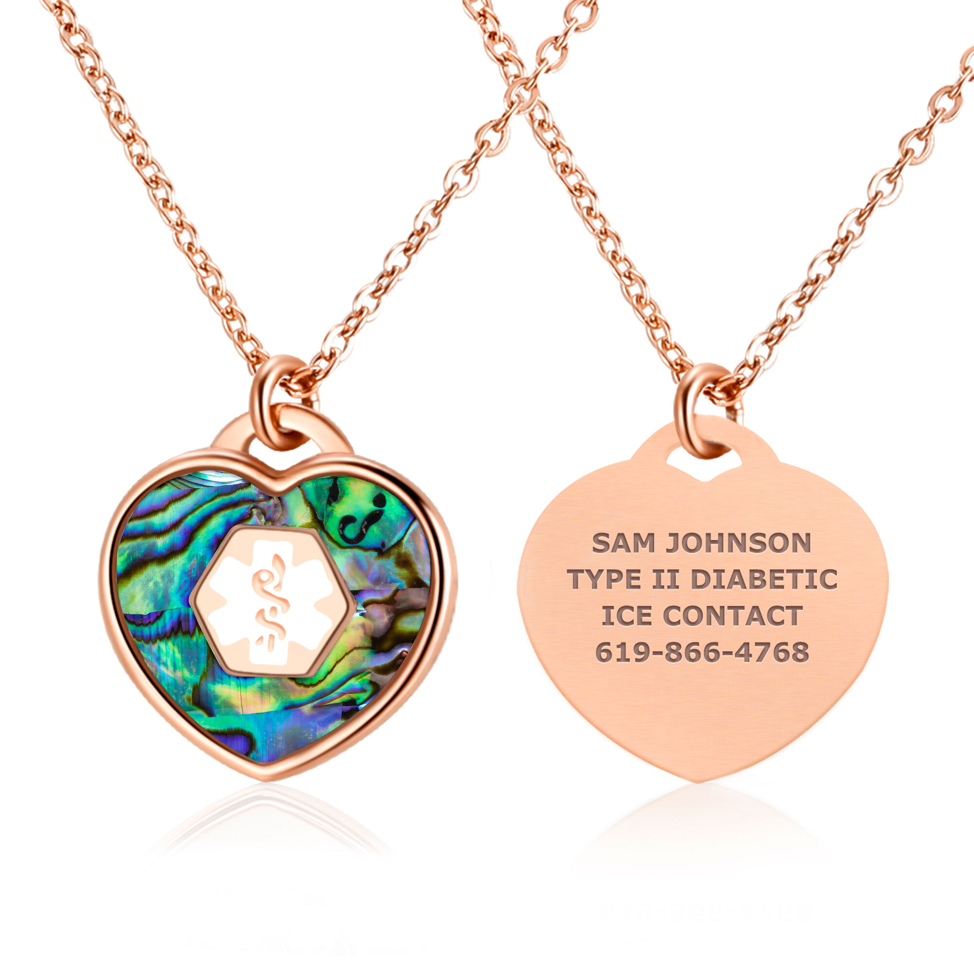 A rose gold heart-shaped medical alert necklace displayed on a white background. The front pendant features an iridescent abalone shell inlay with a white medical alert symbol (Staff of Asclepius) at the center. The back pendant is engraved with "SAM JOHNSON," "TYPE II DIABETIC," "ICE CONTACT," and "619-866-4768." The necklace has a delicate rose gold flat-link chain, combining elegance with essential medical functionality.