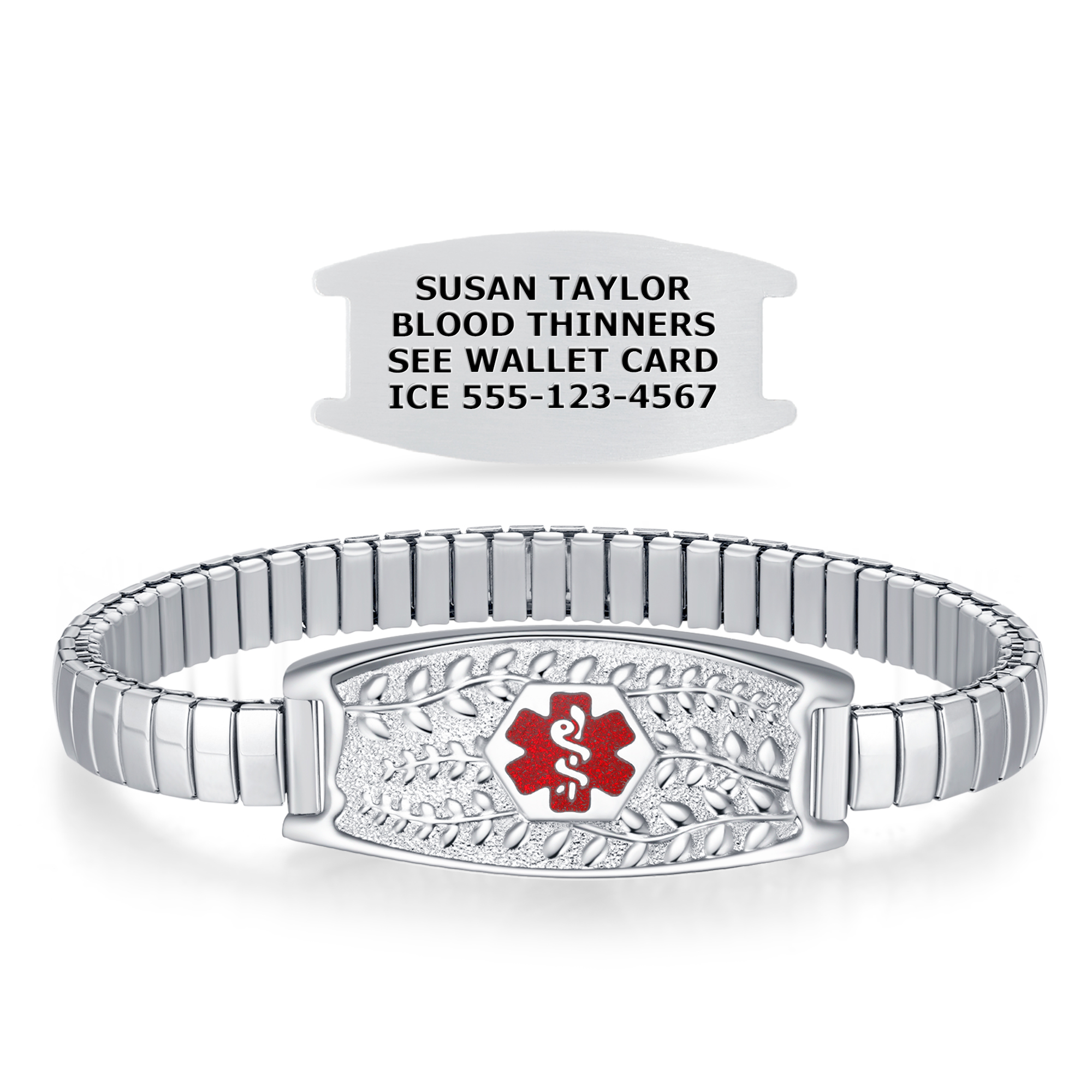 A silver medical alert bracelet featuring a decorative central plate with raised leaf and vine motifs, a textured background, and a prominent red Star of Life medical symbol. Below the bracelet is a separate silver medical ID tag engraved with the name "Susan Taylor," medical condition "Blood Thinners," a note to "See Wallet Card," and an emergency contact number "ICE 555-123-4567." The bracelet combines functionality with a stylish design, offering both medical safety and aesthetic appeal.