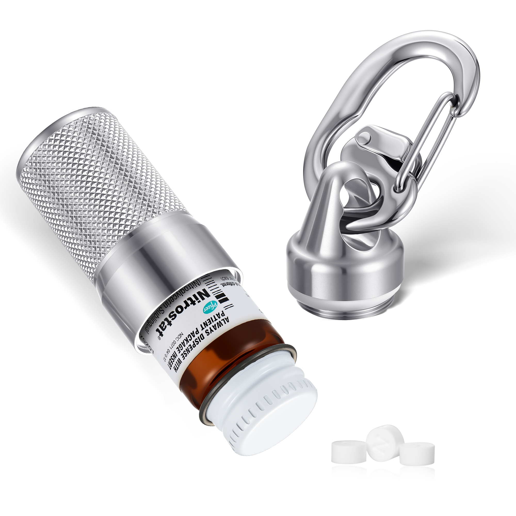 Silver knurled pill container holding a brown Nitrostat bottle with visible Pfizer branding, accompanied by a carabiner clip and three white tablets, designed for portability and quick access.