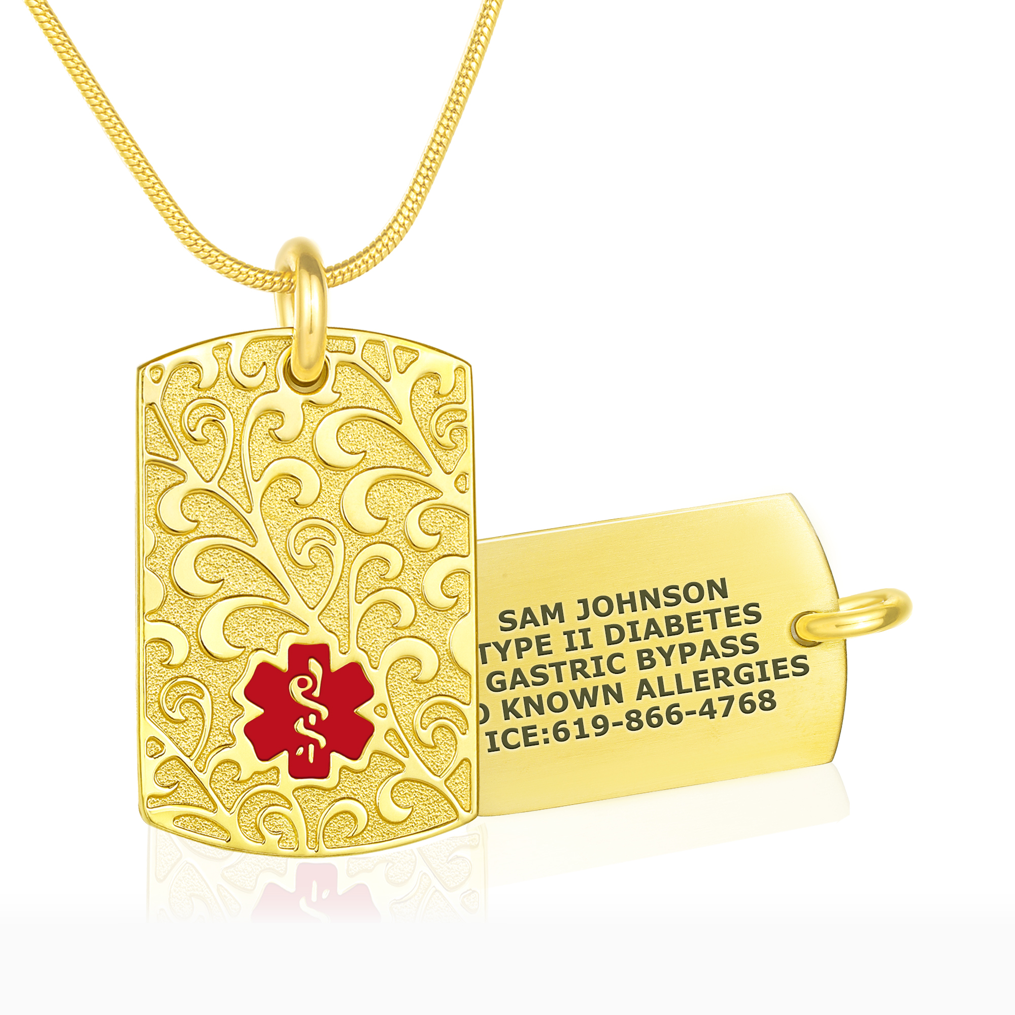 A gold medical alert necklace featuring a rectangular dog tag with intricate scrollwork and a red Star of Life medical symbol in the center. Behind it, a second gold dog tag is angled to display engraved medical details: "SAM JOHNSON, TYPE II DIABETES, GASTRIC BYPASS, KNOWN ALLERGIES, ICE: 619-866-4768" in black text. The necklace includes a polished gold snake-link chain, all set against a clean white background with subtle reflections.