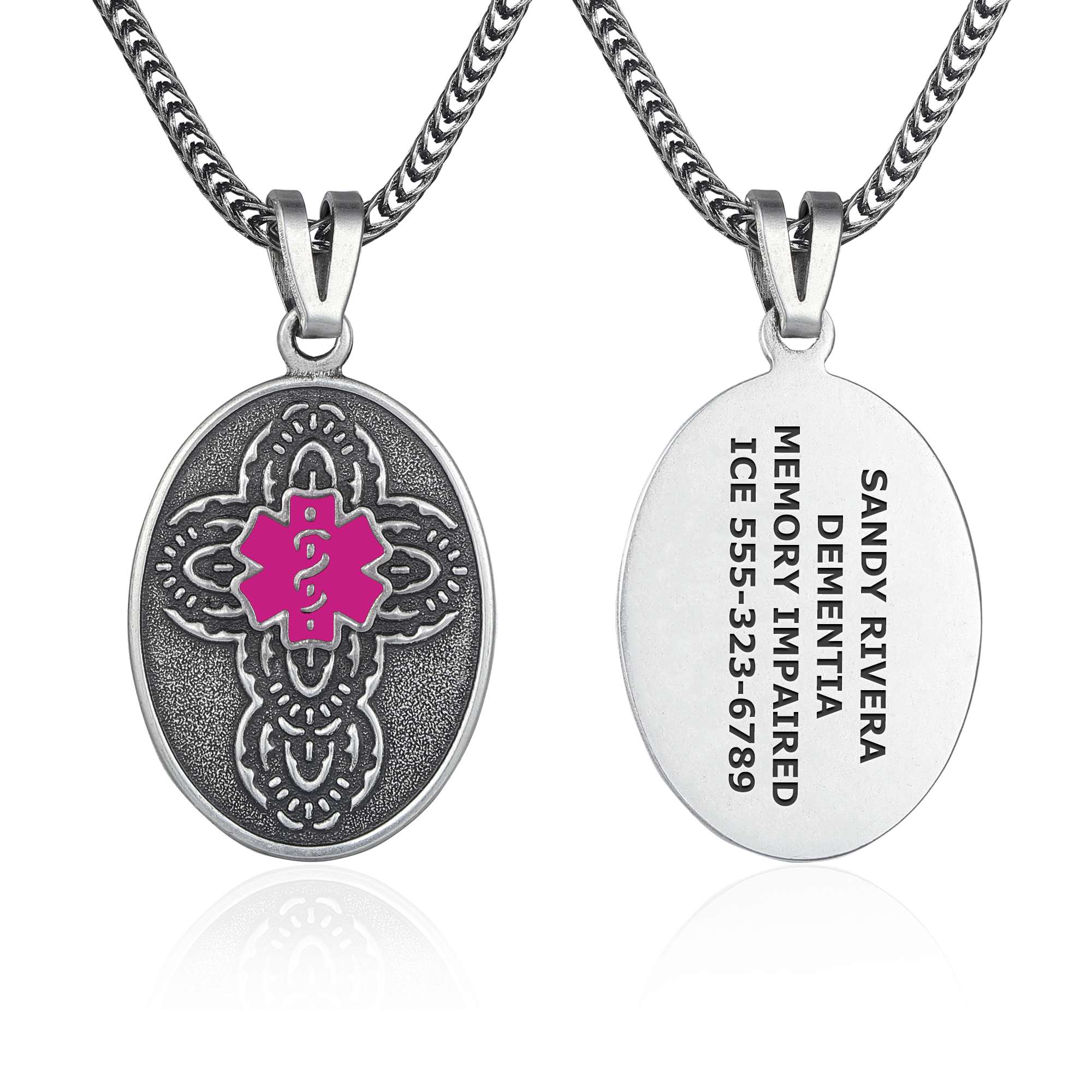 Silver medical alert pendant displayed on a white background, shown from both front and back views. The front features an ornate, textured design with a bright pink Star of Life medical symbol at the center, set against an antique silver finish. The back is smooth and engraved with 'SANDY RIVERA, DEMENTIA, MEMORY IMPAIRED, ICE 555-323-6789' in dark text. The pendant hangs from a sturdy silver foxtail chain, combining functionality with an elegant design.