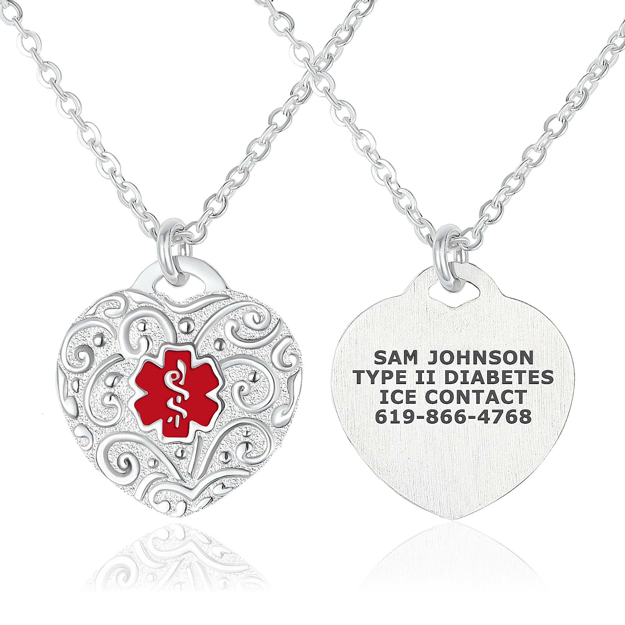A silver heart-shaped medical alert necklace displayed on a white background. The left pendant shows the front design, featuring an ornate filigree pattern with a red Rod of Asclepius medical symbol at the center. The right pendant displays the back, engraved with "SAM JOHNSON," "TYPE II DIABETES," and "ICE CONTACT 619-866-4768." Both pendants are attached to delicate silver chains, combining elegance with functionality.