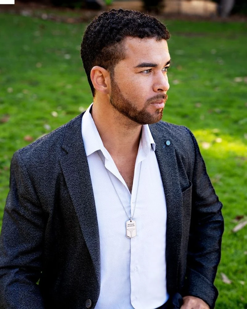 Man wearing a Divoti medical ID necklace