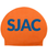 Orange SJAC latex swim cap with bold navy SJAC lettering, durable latex material for competitive swimming.