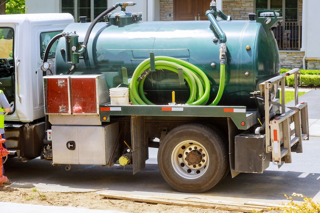 portable-restroom-cleaning-septic-truck-sewe.jpg