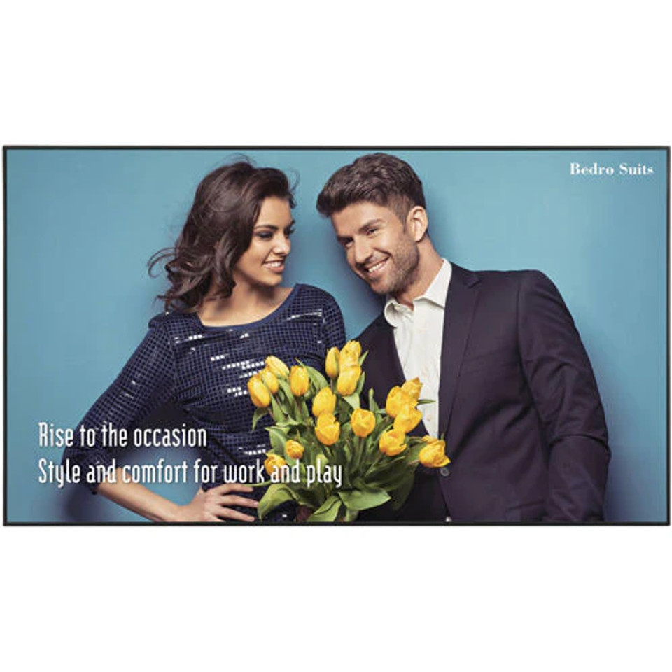 Massive 86-inch Sharp PN-UH861 display mounted in a corporate lobby, running 16/7 digital signage content