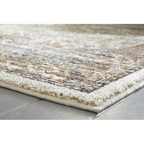 Ashley Furniture Jirair Tan Blue Rust Rugs