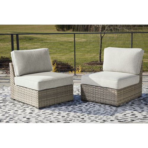 2 Ashley Furniture Calworth Beige Armless Chairs With Cushion