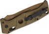 The Benchmade 2750FE-04 Auto Adamas, designed by Shane Sibert, is a hard-use automatic folding knife built for tactical and heavy-duty applications. Featuring rapid deployment via Benchmade's Auto AXIS mechanism, this folder delivers reliable, one-handed operation when speed is critical. The 3.78-inch drop point blade is crafted from MagnaCut steel, offering a superb balance of toughness, edge retention, and corrosion resistance. This flat-ground blade is finished with a Flat Dark Earth Cerakote coating for added protection and minimal reflectivity. The handle features textured OD green G10 scales, providing a secure, comfortable grip under demanding conditions. At an overall length of 8.89 inches and weighing 5.81 ounces, this tough folder is ready for anything. Includes a ballistic nylon sheath and reversible pocket clip.