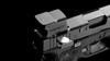 Once mounted and zeroed, a working optic should require minimal attention. The side-loading CR1632 battery can be replaced without removing the SE MOS from the slide, preserving the mounting setup and avoiding unnecessary re-zeroing. Motion activation turns the optic on when movement is detected and shuts it down after three minutes of inactivity. Brightness memory restores the previous setting, while a low-power indicator provides advance notice when battery voltage drops below 2.2 volts. Maximum runtime reaches 140,000 hours in Mode 3 with the 2 MOA dot only.  The multi-reticle system offers a 2 MOA dot, a 32 MOA circle, or both together. The dot provides a finer aiming reference, while the circle creates a more prominent visual index. The aspherical lens and coating system support a clear, consistent sight picture across all three configurations.