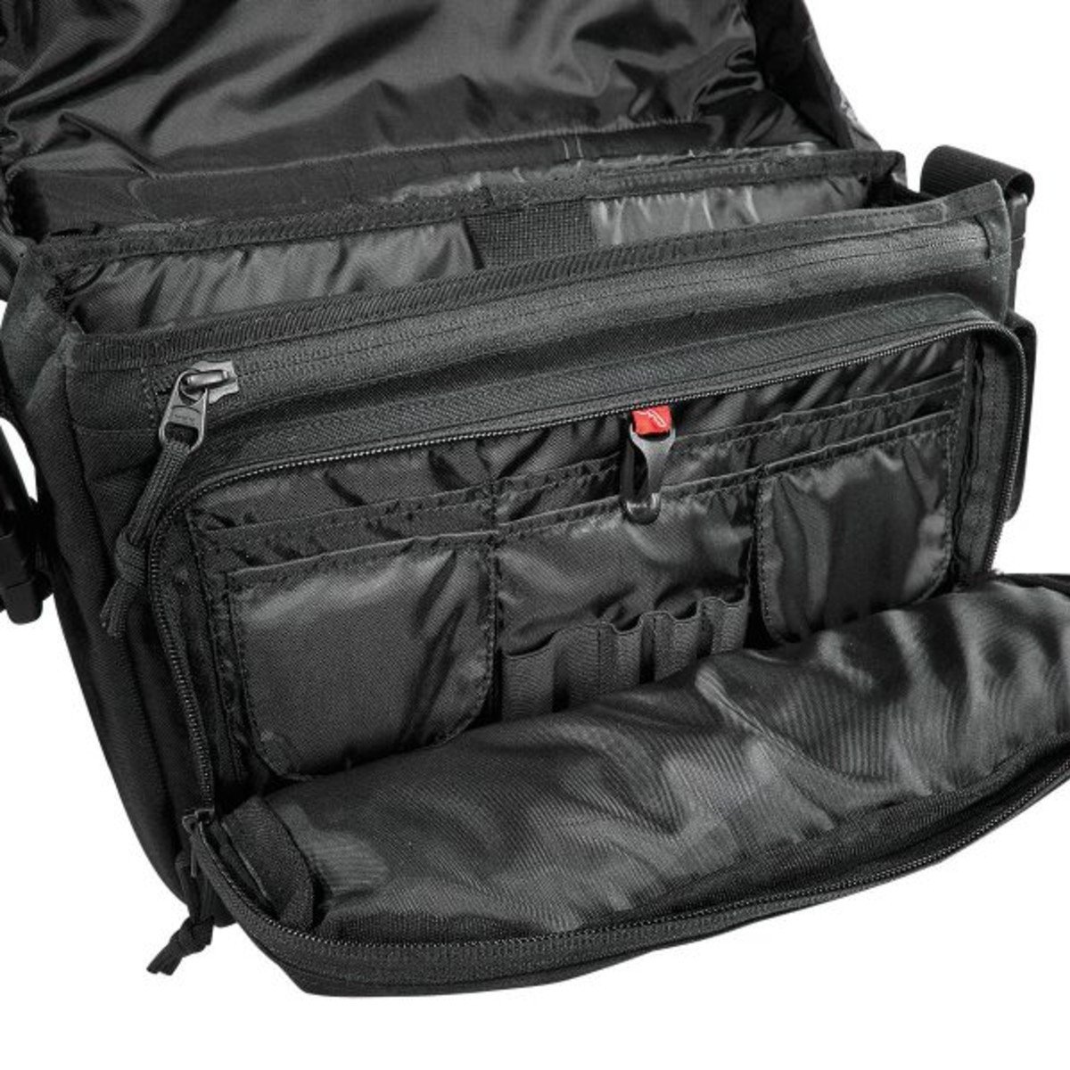 Smaller version of our Larger TT Tac Case. This is a functional civilian-look shoulder bag that is also suitable for security forces. A product in Tasmanian Tiger's civilian series. Beneath the lid is a concealed MOLLE strip for equipment. Also fitted with a removable organizer bag.

