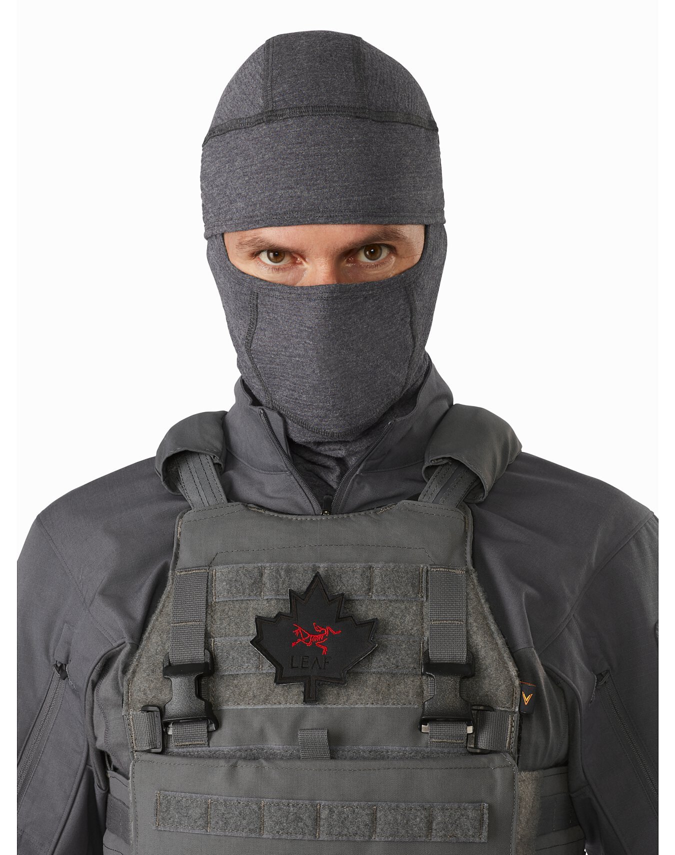 A flame resistant balaclava that is worn when conducting Direct Action tasks that will provide user protection from flame/incendiaries. An ergonomic design and flat seam construction techniques allow for enhanced comfort when worn in conjunction with a helmet, eye protection, ear protection and/or O2 mask. FR mesh materials and construction techniques, allowing the balaclava to be worn in either an eyes exposed only or full face exposed manner, allows for enhanced ventilation that mitigates overheating and undue fog/moisture build-up on eye protection.