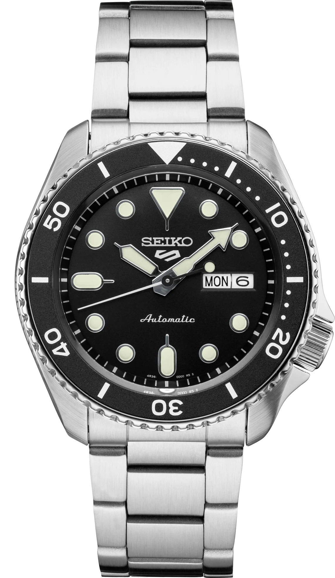 This is a new Seiko automatic 5 Sports watch that features a Seiko 24 jewel automatic (self-winding, hand wind, hacks) movement. The black dial has a day and date display at 3:00, highly luminous hands and markers treated with Lumibrite for low light visibility, an offset crown at 4:00, a uni-directional rotating bezel, a Hardlex mineral crystal and an exhibition window screw-down case back. 42.5mm diameter stainless steel case. It comes on a stainless steel bracelet with a deployant clasp. Manual and Seiko box are included
