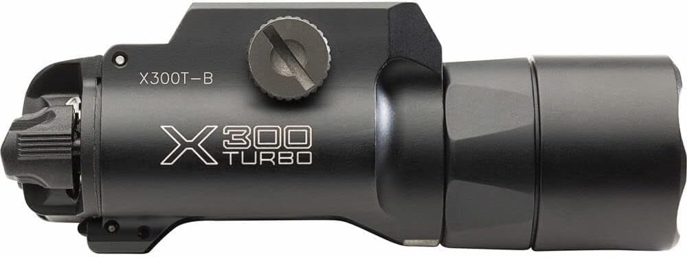 Surefire, X300 Turbo, Weaponlight, White LED, 650 Lumens, 66,000 Candela, Fits Picatinny and Universal, Thumbscrew Attachment, For Pistols, Matte Finish, Black, 2x CR123 Batteries Included. Powered by two 123A lithium primary batteries, the X300T-A generates 66,000 candela of high-intensity into a compact, handgun-practical form factor. In addition, all Surefire high-candela WeaponLights feature reliable, intuitive switching, and they can be accessorized with the most comprehensive switching options in the industry. SureFire Turbo Series models are engineered to take a beating and thrive in any environment, just like when Surefire pioneered high-candela illumination tools two decades ago. There's no room for compromise when you depend on your equipment to save your life. That's why every SureFire Turbo Series model is constructed of rugged, lightweight aerospace aluminum, Mil-Spec hard-anodized, and O-ring sealed to keep out the elements. As a result, they're the best-performing, most feature-rich illumination tools in their class. Some things never change.