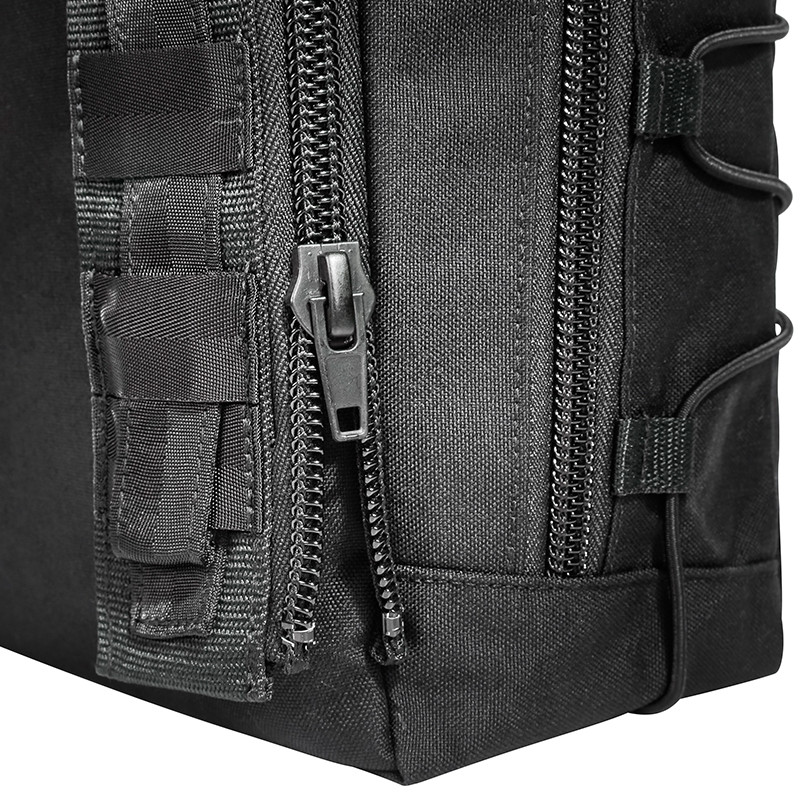 The TACVEC Pouch 1 is a quick release equipment bag with a zipper adapter that fastens to the TT Front Seat Panel. Utilizing special adapters, the pouch can be attached to the TT Modular Front Seat Panel which can be quickly and easily removed. It has a pocket, MOLLE hook and loop, elastic loops inside and its volume can be regulated using bungee cords. Due to its size it cannot be used at the same time as the weapons attachment