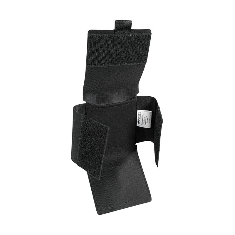 The TT Glove Pouch MKII is a small accessory belt pouch. Holds one pair of leather tactical gloves or two pairs of latex gloves. It can be carried horizontally or vertically. Hook-and-loop fastener for 1-2.15in/30-55mm width belt. (BELT NOT INCLUDED)

