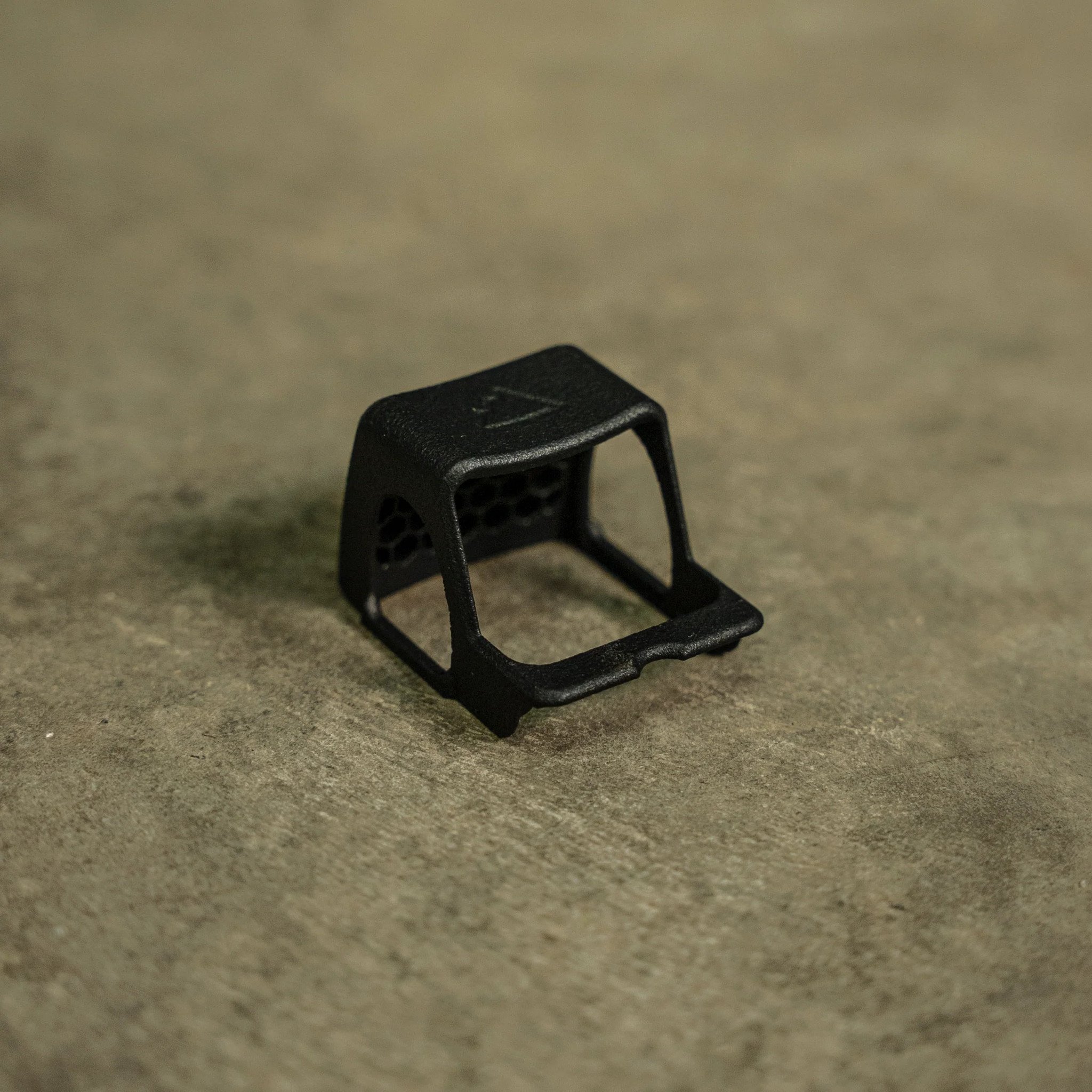 The HexCap is a ruggedly simple, snap-fit Anti-Reflection Device (ARD) that installs securely in seconds to your red dot sight with no additional hardware.

