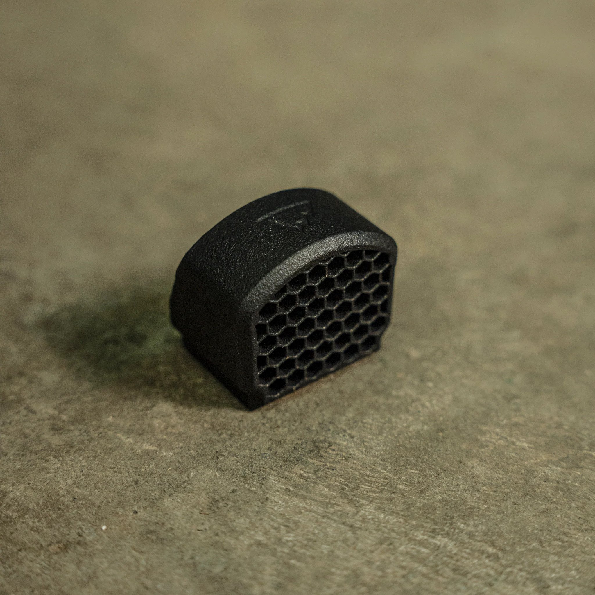 The HexCap is a ruggedly simple, snap-fit Anti-Reflection Device (ARD) that installs securely in seconds to your red dot sight with no additional hardware.

