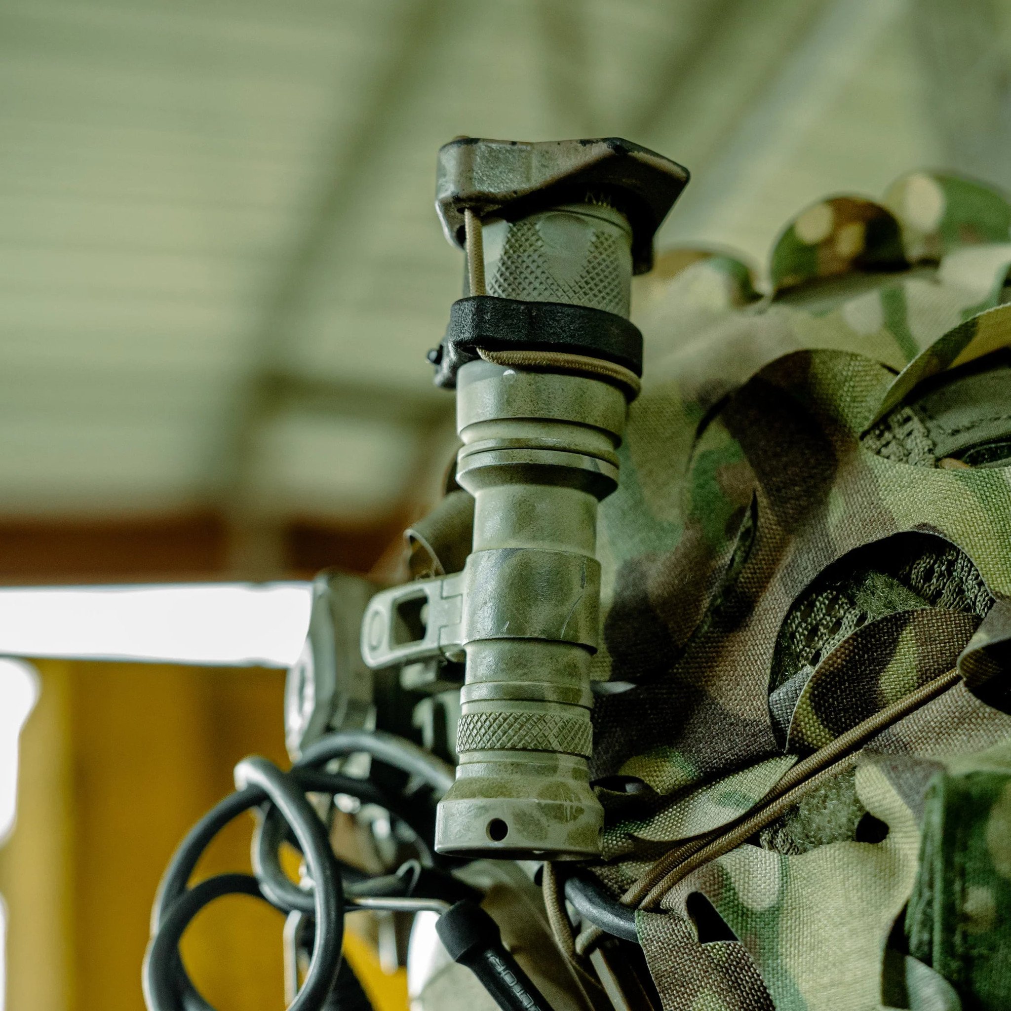 One of the biggest pieces of feedback we've received on our products is the difficulty of installation and battery changes when using our ScopeCap ™ and LightCap ™ products. By developing a locking ring with eyelets to fit the shock cord, we were able to completely eliminate the need for ranger bands and looping the shock cord around the light or optic body.

